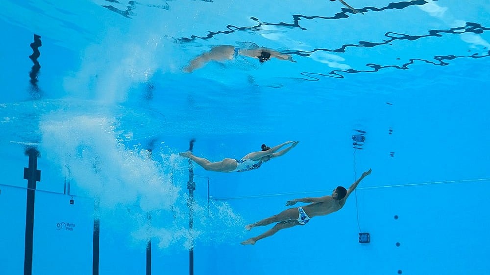 | Photo: AP/Lee Jin-man : Swimming pool file